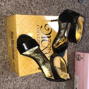 Ankle strap high heel sandals.